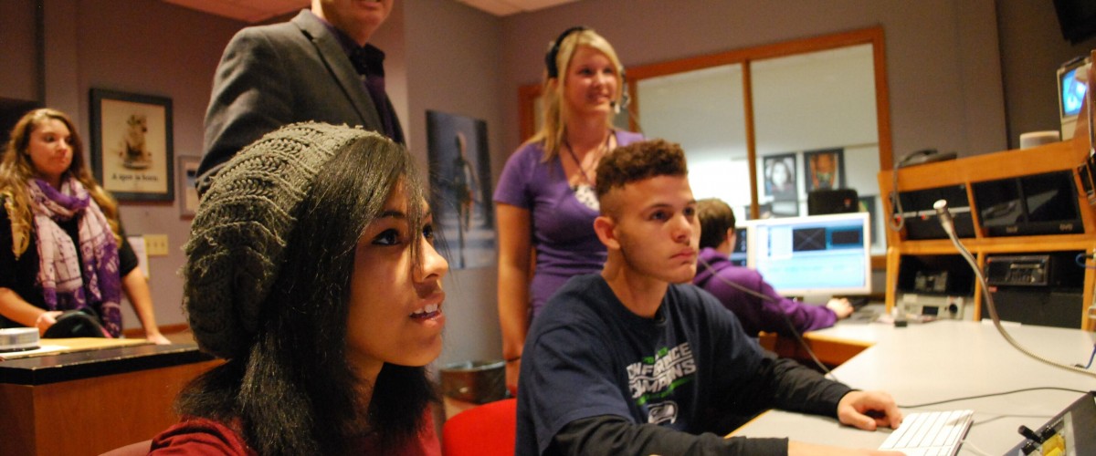 Image of students working in news studio